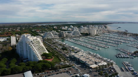 La-Grande-Motte-resort-town-with-marina-France-aerial-shot-buildings-waterfront